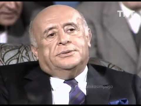 süleyman şapkayı kapmaya çalışan adamla konuşuyor