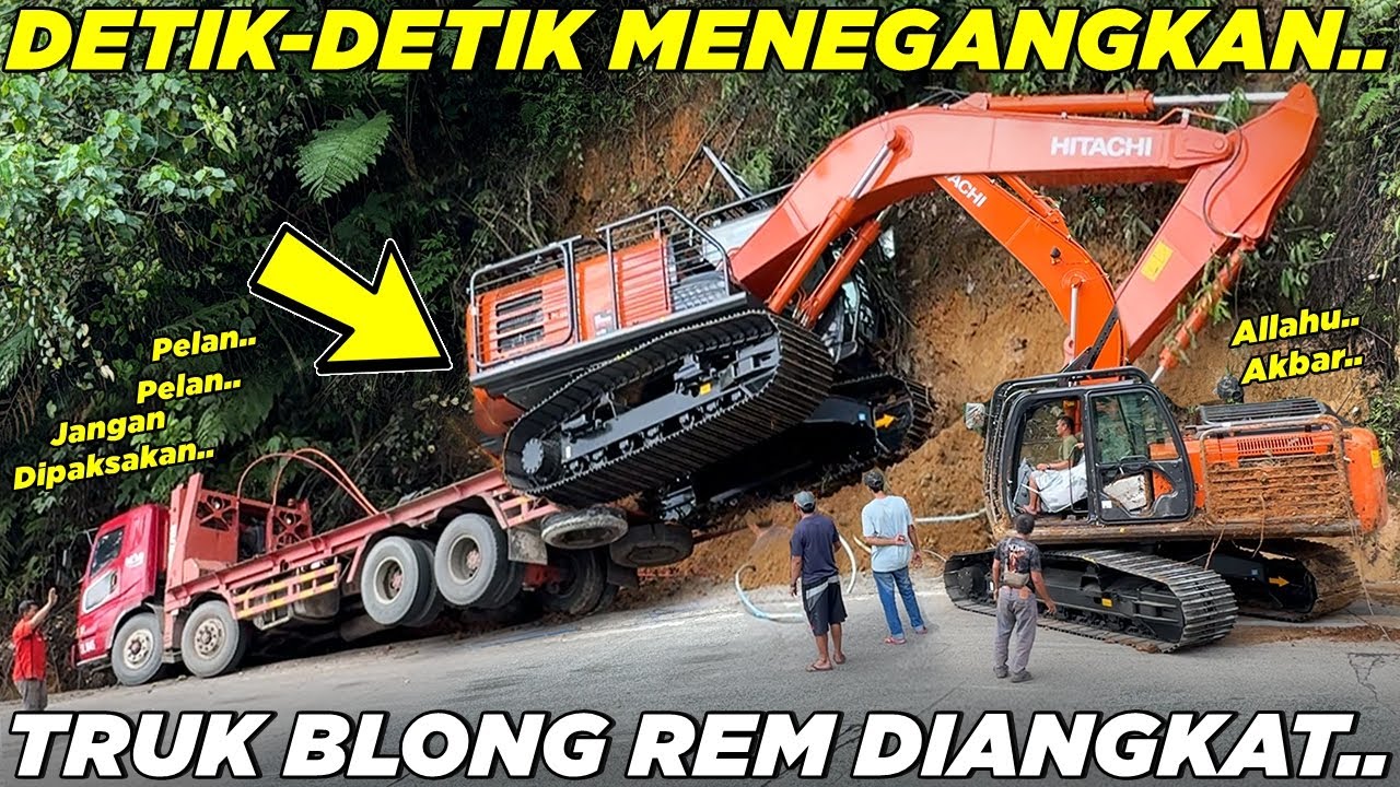 DRAMATIC EVACUATION OF TRUCK LOADING HEAVY EQUIPMENT