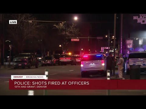 Bystander struck as shots fired at Denver officers late Saturday