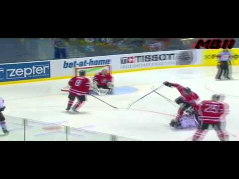 Dion Phaneuf Knocks Out Simon Moser - 2011 IIHF Championship