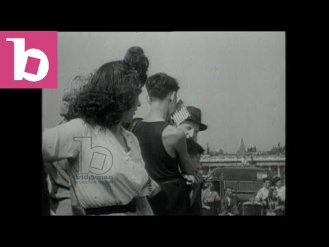 Liberation celebrations in Paris with de Gaulle, German snipers attack, Eisenhower visits