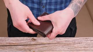 Чоловічий компактний вертикальний гаманець з натуральної шкіри Canpellini 21674 коричневий