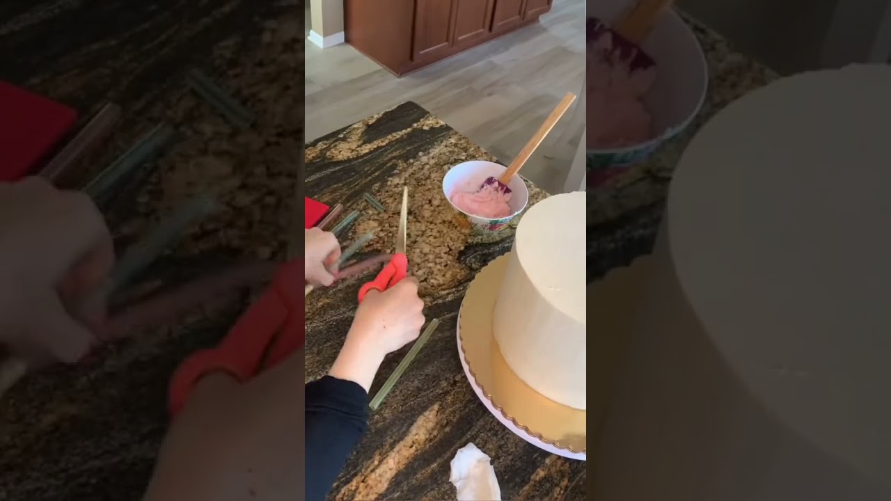 Stacking a buttercream cake