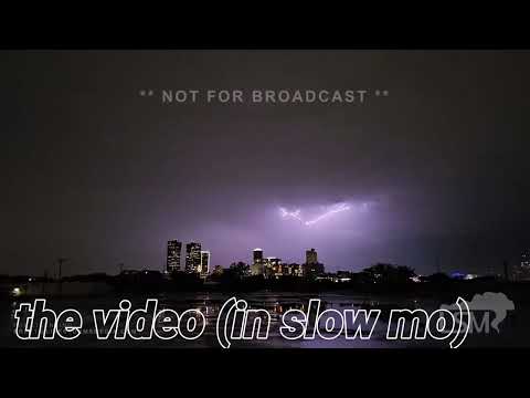 09-08-2023 Fort Worth, TX  - Lightning crawls across downtown Fort Worth skies slow mo-still shot
