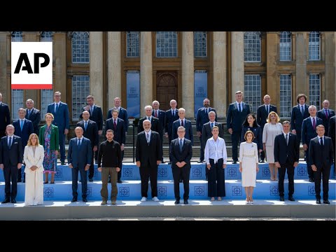 European leaders gather for a family photo at a summit in the UK