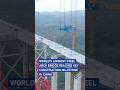 World's longest steel arch bridge reaches key construction milestone in China