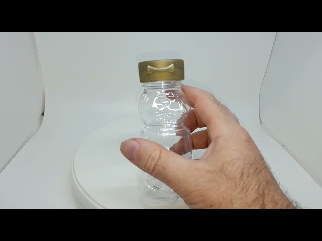 Vídeo relacionado con Dzmuero Dispensador de Miel de Madera de Acacia Con Tapa - Dosificador y Recipiente de Cristal Sellado, Tarro de Boca Ancha Para Guardar (1 Pieza, Transparente)