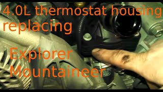 Thermostat housing assembly 2008 Ford Explorer 4.0L How to change thermostat housing