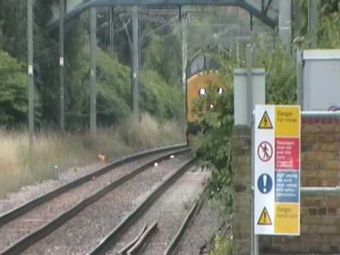 DRS 37682+37688 pass Acton Central with scrap train