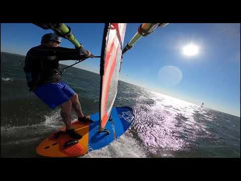 Windsurfing into the sunrise at Scenic View