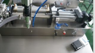 preview picture of video 'grape seed oil filling machine semi auto pneumatic liquid filler aceite de la máquina de llenado'