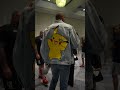 Alex Pereira was gifted a Pikachu jacket at #UFC287 media day ?