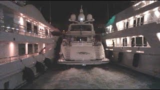 Yacht trying to dock in Monaco at night in very tight gap!