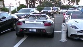 Valet parking has some difficulty to drive a Porsche Carrera GT! Monaco