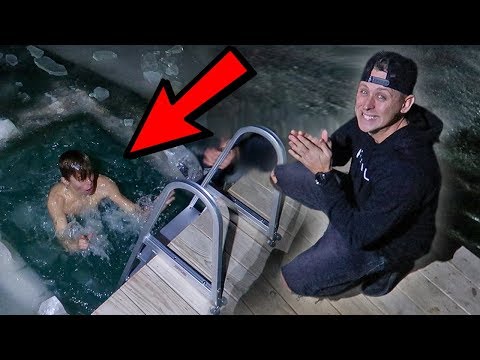 DIVING INTO ROMAN ATWOOD’S ICE POND! *freezing* Video