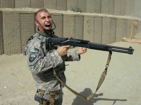 Sailor rocking a semi-automatic Benelli M4 tactical shotgun in Afghanistan