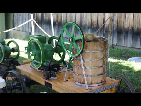 Antique Tractor Powered Ice Cream Maker Churning Ice Cream at the Tunbridge Worlds Fair in Vermont
