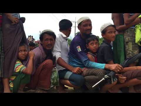 Rohingya refugees in queue for relief goods  Video by Shahidul Alam 4756