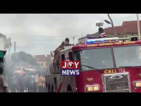 Firefighters use sachets of water to battle fire that destroyed 11 rooms at Manhyia South