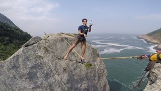 Highliner Juggles Over Cliff Face