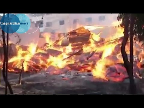 Click to Watch the Syrian President Assad allegedly using flaming NAPALM attacks on city video