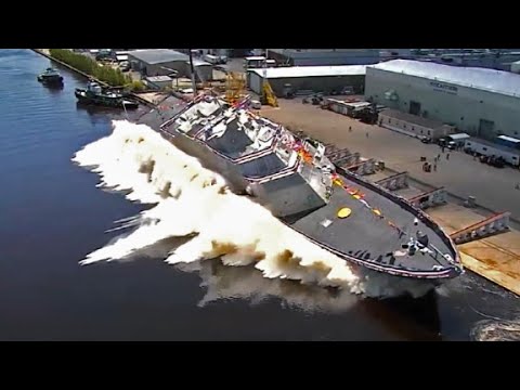 New US Navy warship launches into river