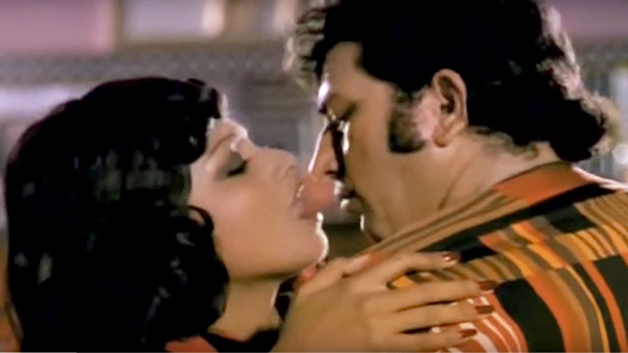 Nigahon Ka Adaaon Ka Lyrics  | Chakkar Pe Chakkar | Shashi Kapoor, Rekha | Asha Bhosle | Anandji Virji Shah, Kalyanji Virji Shah