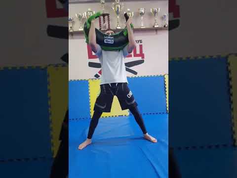 Roman Nepota shows the exercise with the Bulgarian Bag