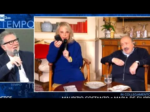 MARIA DE FILIPPI SCOPRE CHE MAURIZIO COSTANZO NASCONDE CARAMELLE NEL PORTAOCCHIALI