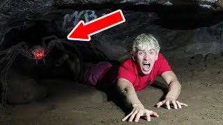 EXPLORING ABANDONED SPIDER CAVE!! (HAUNTED)