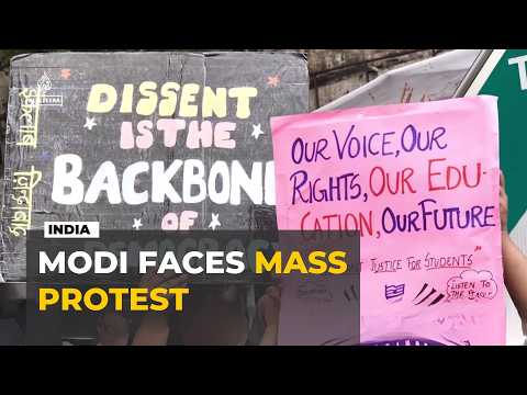 India protest: Police fire tear gas as thousands demand PM Modi's resignation