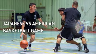 Japanese and American service members compete on the Basketball court