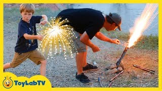 Family Fun Night Playing with Fireworks on 4th of July Lighting Parachute Fireworks & TNT Poppers