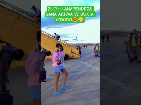 ZUCHU AKIWA AMEVAA VIZURI AKITEMBEA UWANJA WA NDEGE