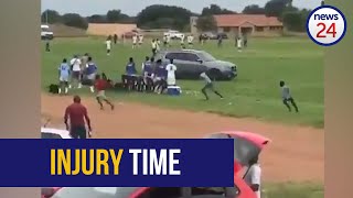 WATCH | Fast and furious: Soccer players run for cover as car speeds onto field