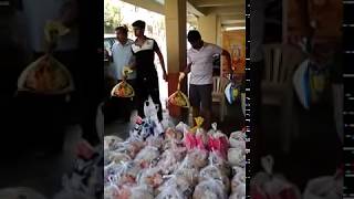 Covid 19 - Vijayawada VT Chaithanya Patamata team packing provisions to 100 families