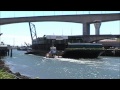 Spokane Street Swing Bridge opens and closes for a Barge