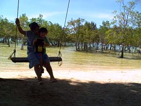 Santi Swings in Playa Beach