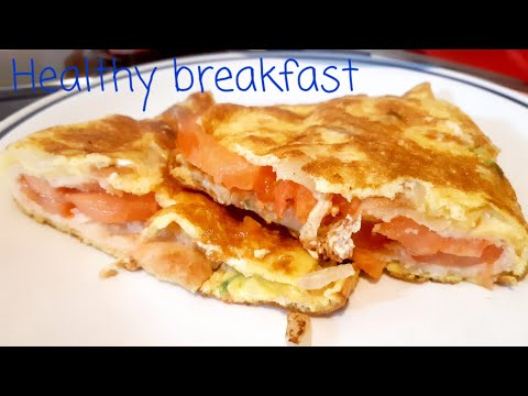 2 eggs,2 sliced tomato and one sliced bread to make a...