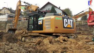 preview picture of video '**NEW** Caterpillar 329E Triple Boom Loads Tractors / Fa. Wild, Backnang, Germany, 2014.'