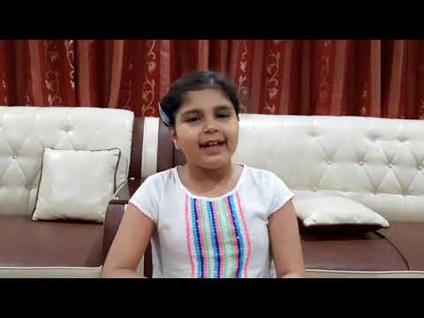 Hooriya singing colours with papers