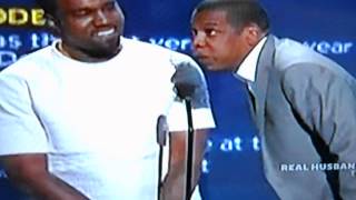 Jay Z playfully interrupts Kanye's acceptance speech, and Kanye laughs it off, saying he was just defending Jay's wife back in 2009.