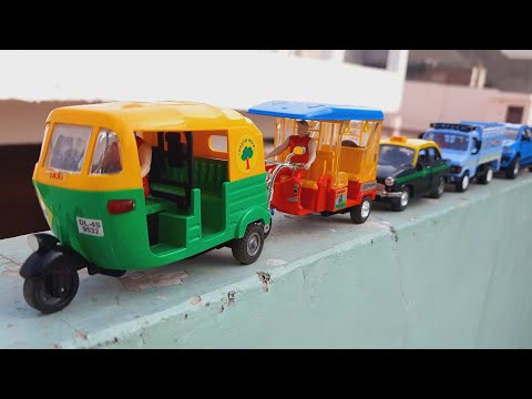 Auto, Jcb, Truck, Toy helicopter hand driven on wall