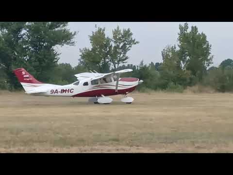 Yak52 and Cessna 206 take off