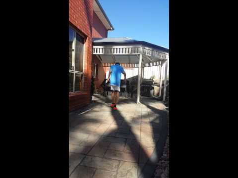12 year old juggling tennis ball