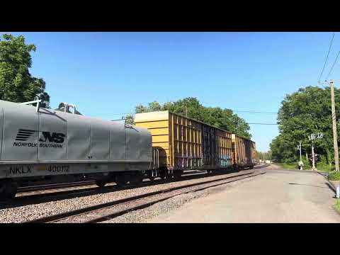 NS 5621 GP38-2 leads CR MA01 through Piscataway with a friendly crew