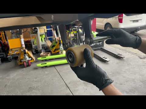 How to change electric pallet jack front wheels