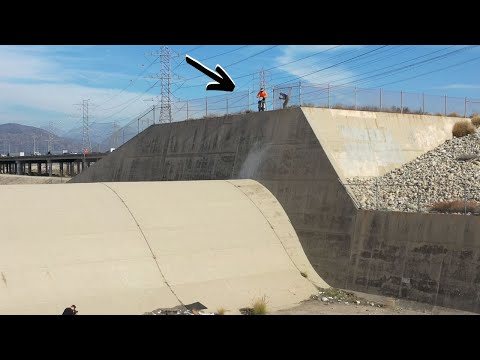 Jumping down a massive drain on a dirt bike