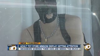 Adult toy store window display getting attention