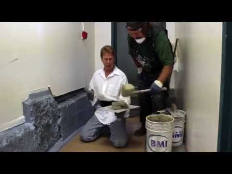 Plastering interior concrete walls. Video